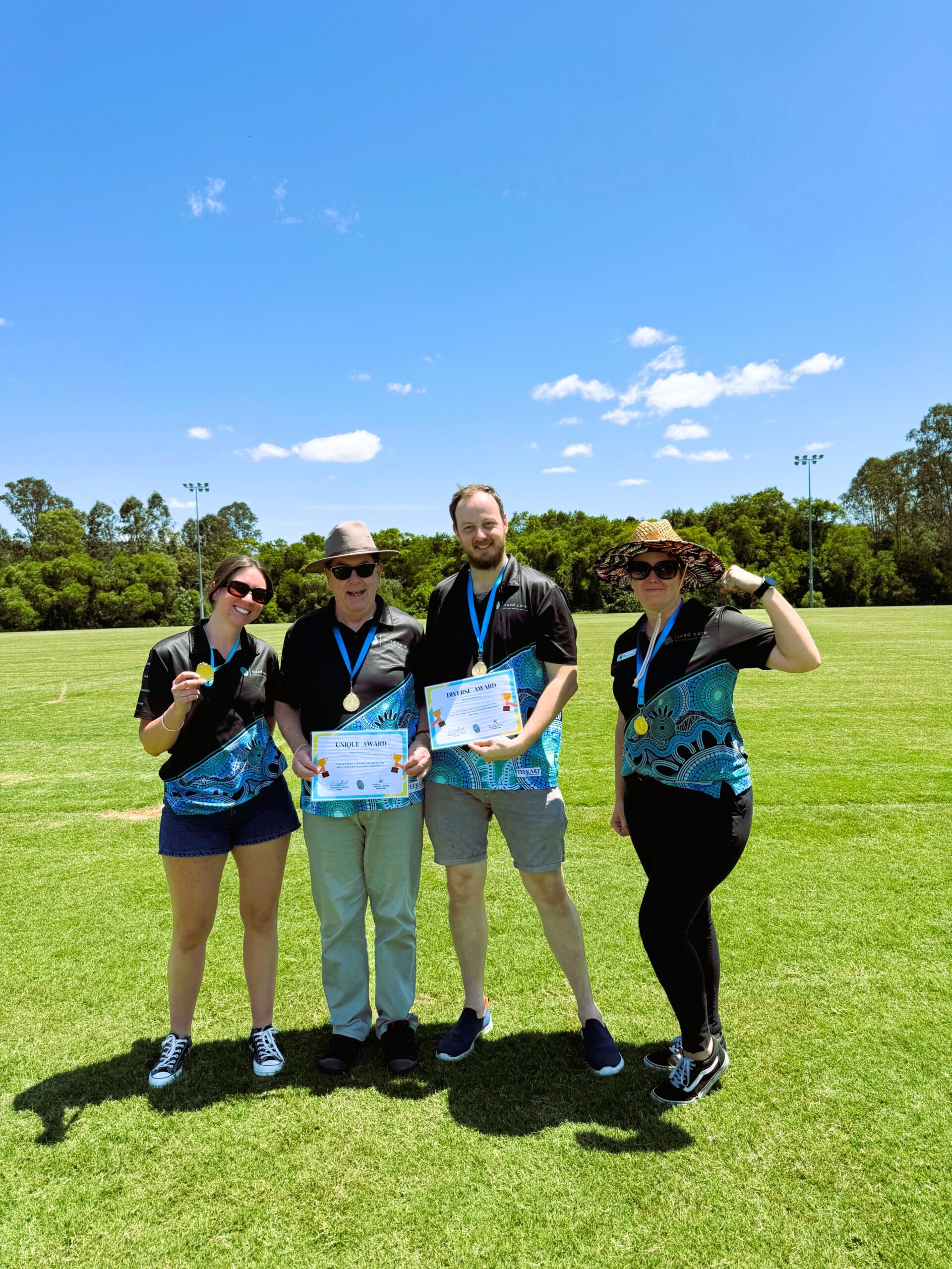 Team at quad care Olympics enjoying the team building activities in the park